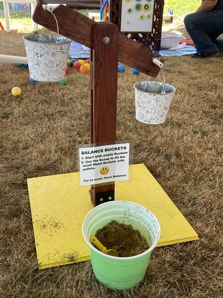 Bucket balance game activity